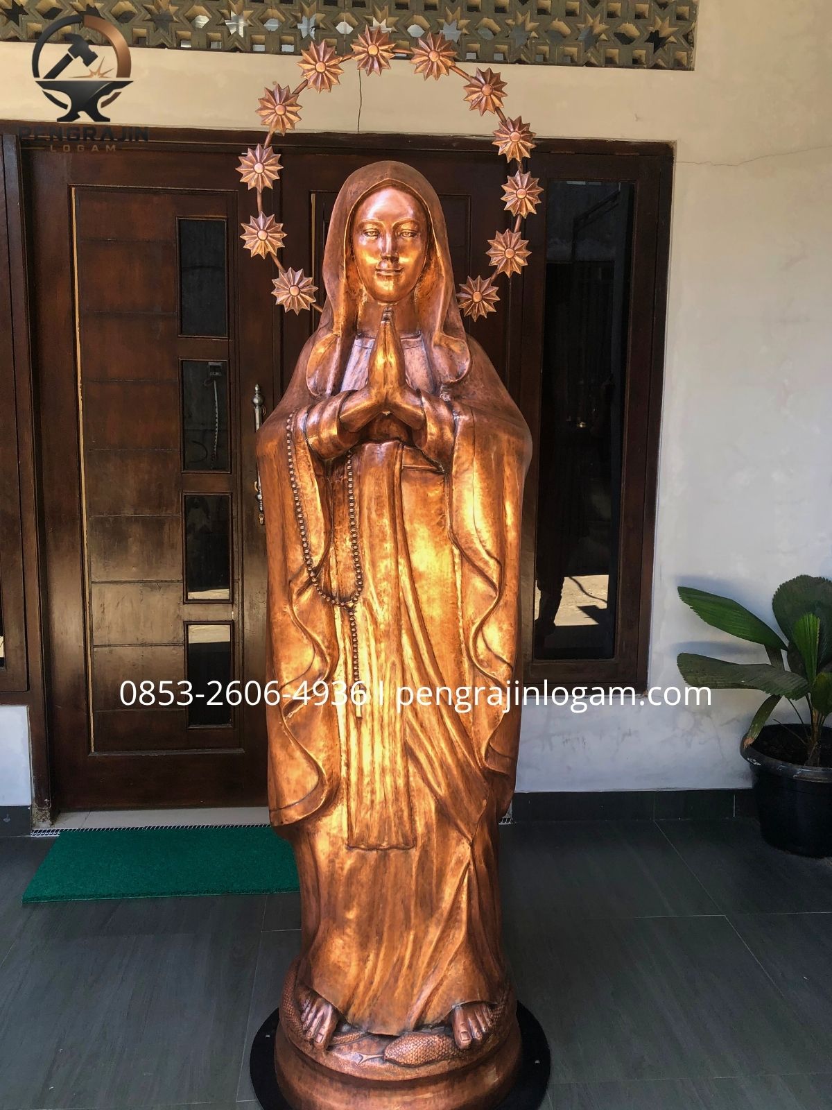 Patung bundha maria tembaga