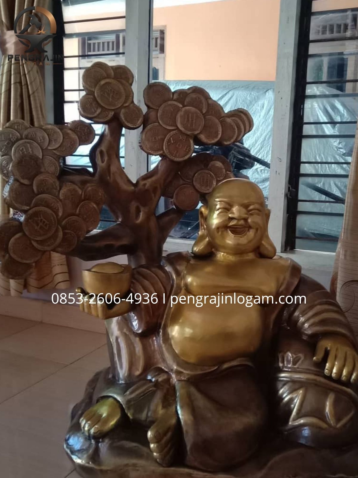 patung dewa uang kuningan