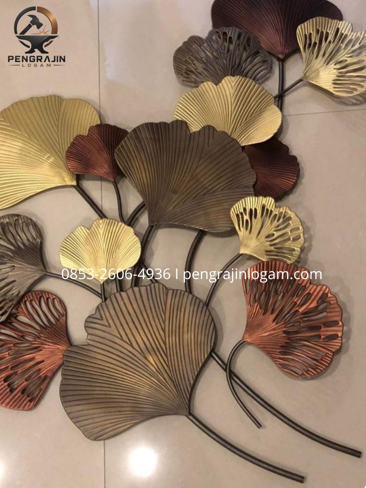 Hiasan dinding kuningan motif Hiasan dinding kuningan motif